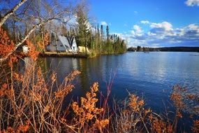 sunny autumn on a lake in quebec