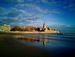 empty beach in a cloudy day in spain, gijon