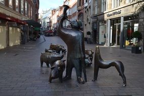 pig breeder monument and pigs on a city street