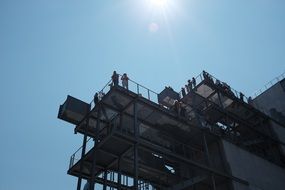 people on metal construction in manhattan