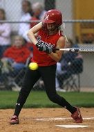 female teenager playing softball