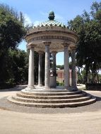 monument in the garden in front of the borghese gallery