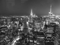 black and white photo of the night city of new york