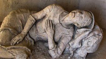 sculpture of an old woman in church