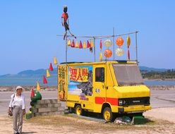 yellow commercial truck on Ishigaki Island, Japan