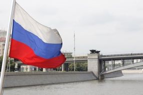 Russian flag on the river