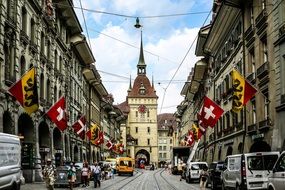 The Old Town street with flags in row on buildings, Swiss, Berne