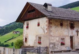 Beautiful old house among the colorful fields