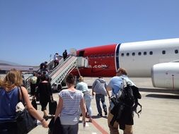 passengers near the plane