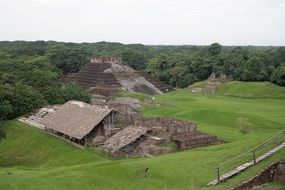 ruins on a green field in mexico
