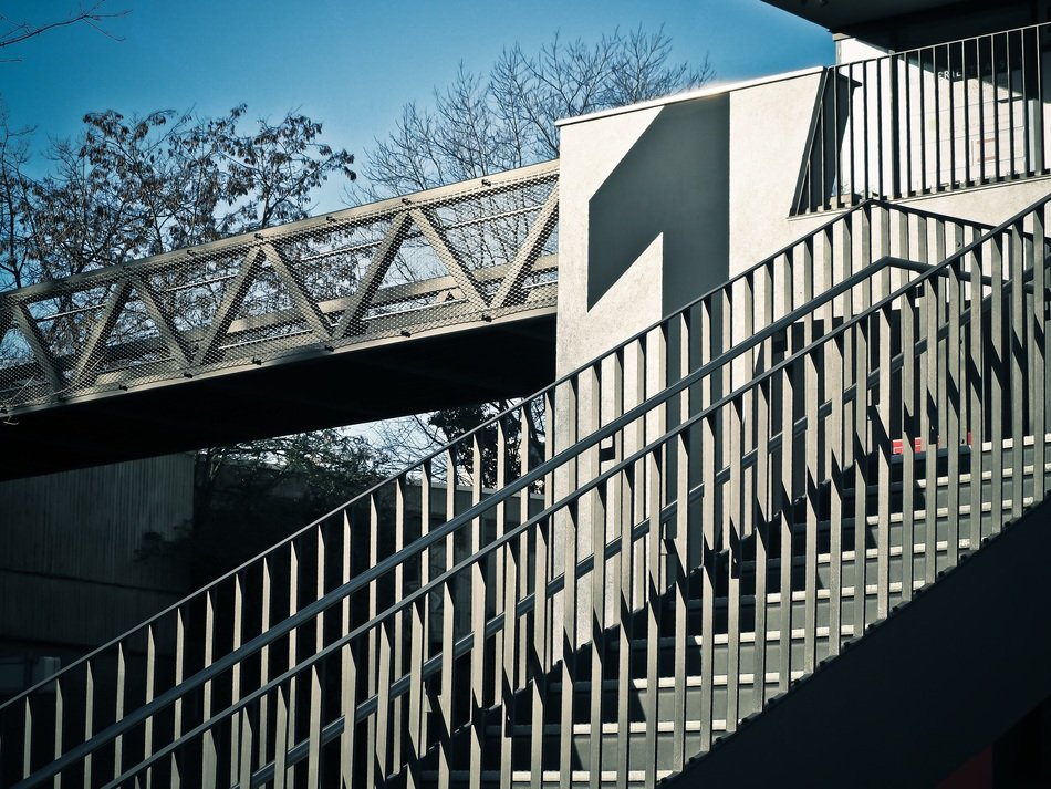 staircase with railing at the transition