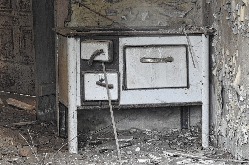 old stove among the ruins