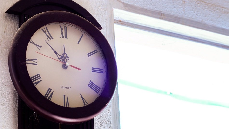 wooden clock on the wall as a decoration