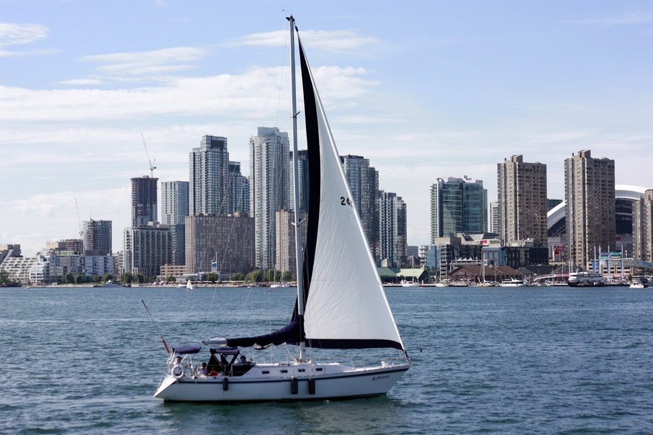 yacht in the ocean against the background of the city of Toronto