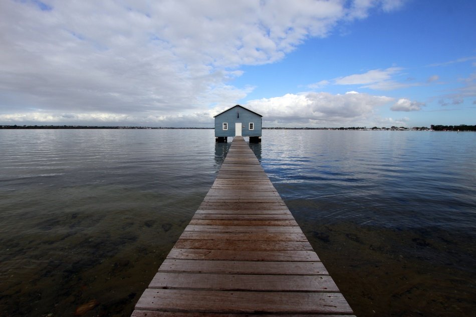 long wooden pier on the coast of western australia