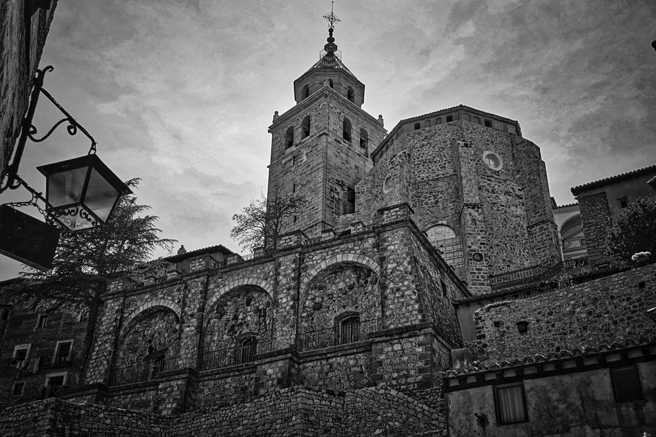 low angle view of aged brick Cathedral, black and white, Spain, Aragon
