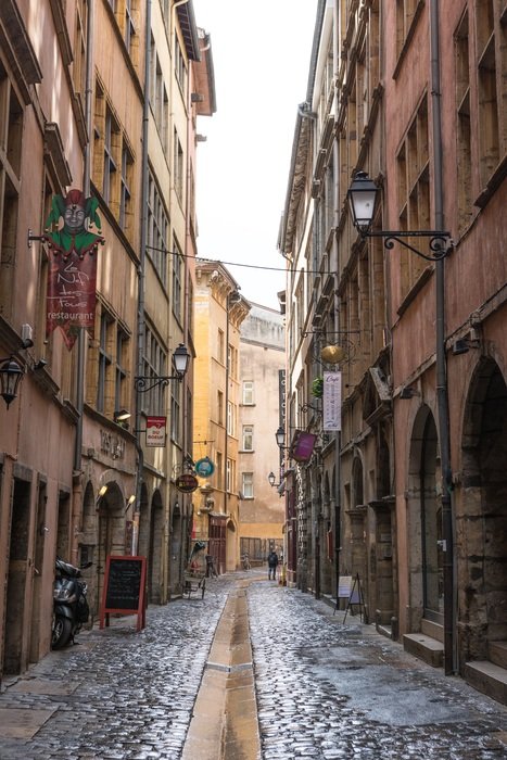 alley in france in rainy weather