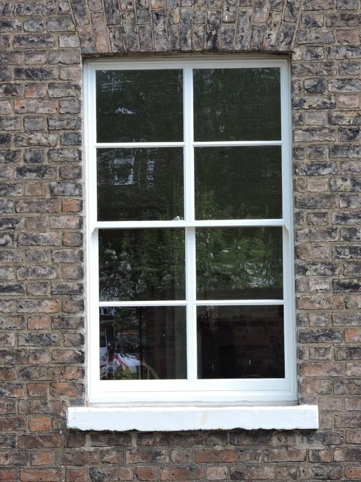 victorian Sliding Sash Window in brick wall