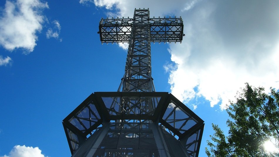 metal cross against the sky