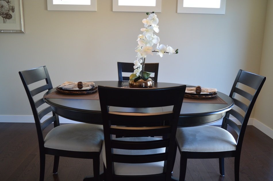 wooden table with chairs in the dining room