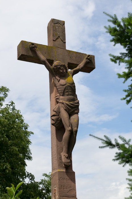 statue of Jesus on a crucifix in Alsace
