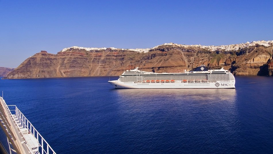 cruise ship off the coast of santorini