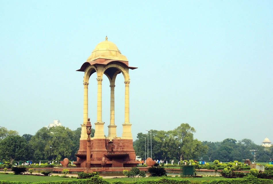 Monument with columns among the plants in Delhi, India