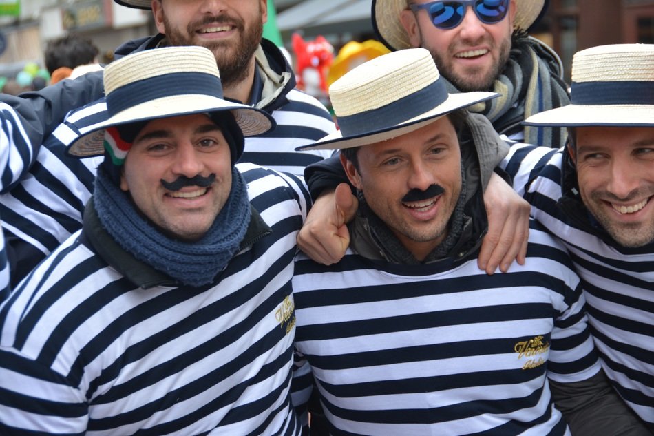 group of rugby players in striped costumes