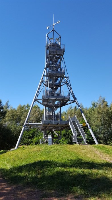 tower on a hill among nature