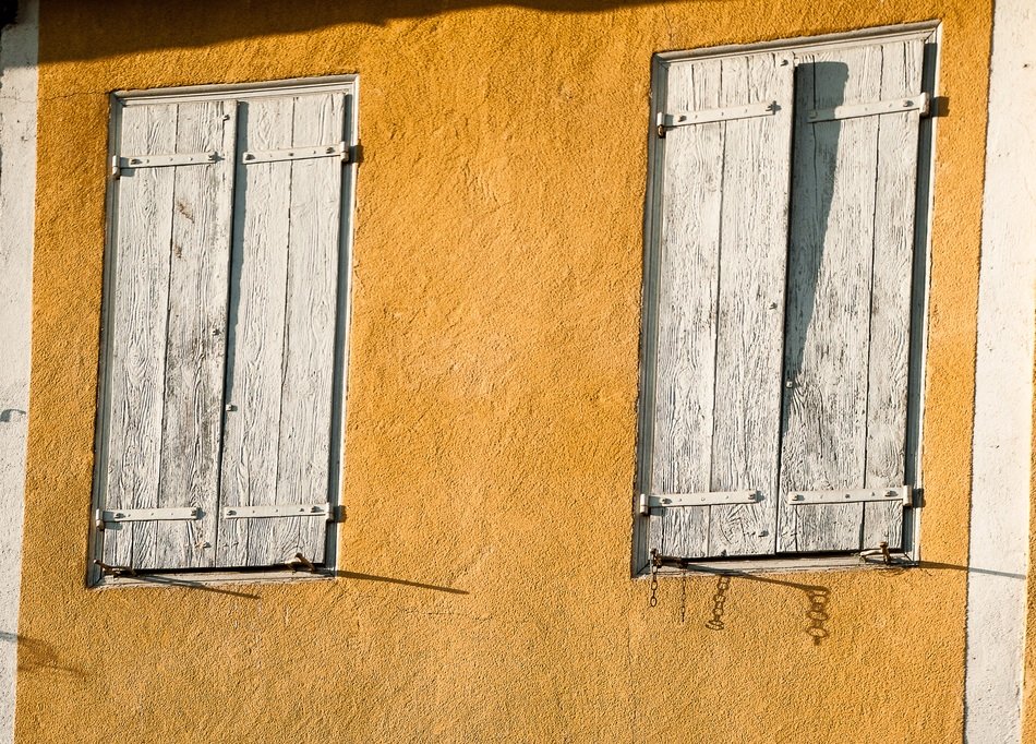 wooden shutters on the orange house