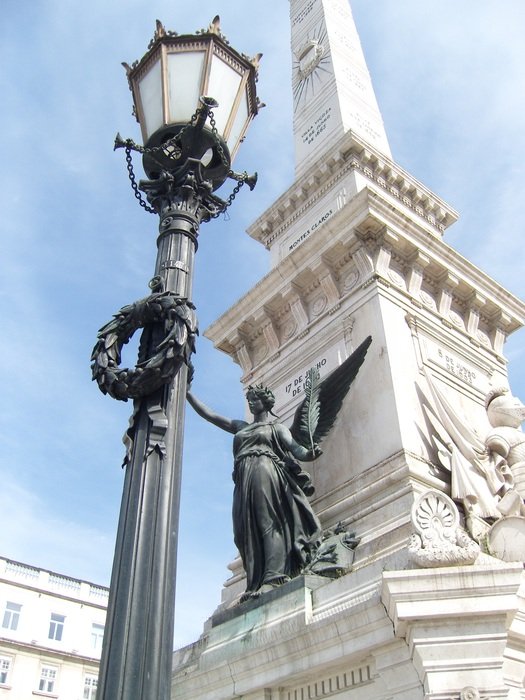 street lamp near the obelisk in lisbon
