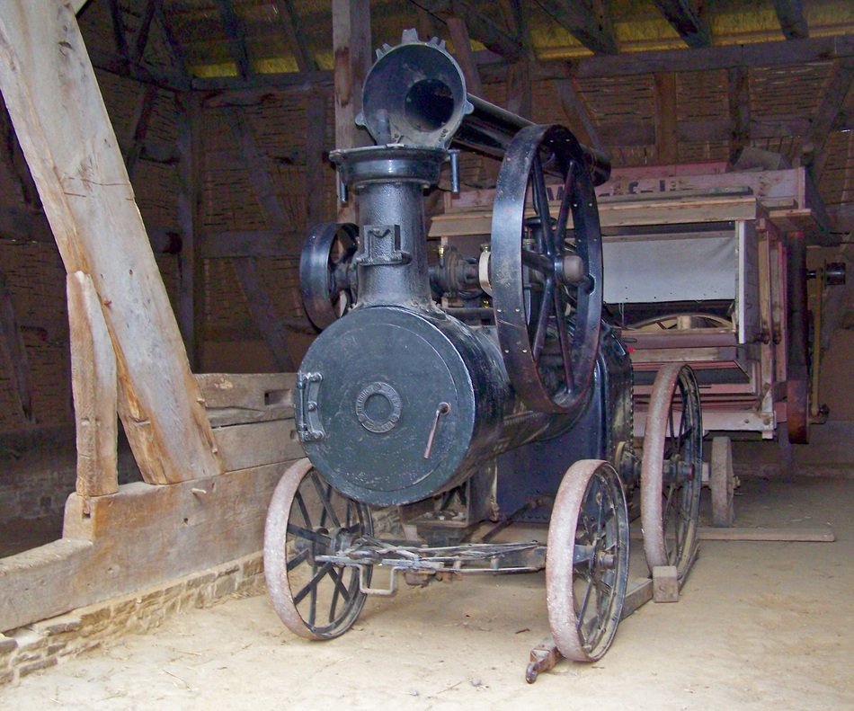 steam engine with trailer on farm