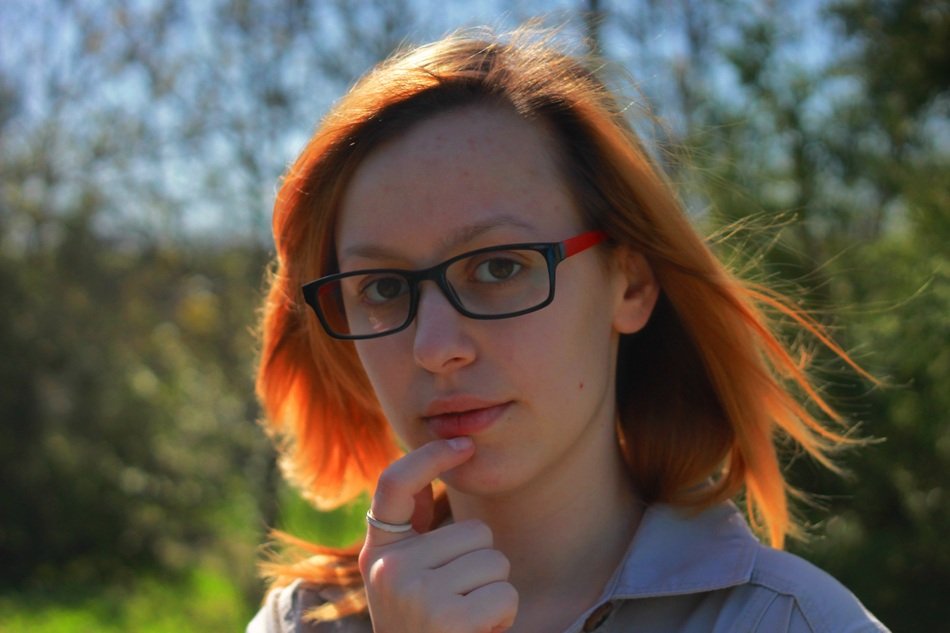 red hair model in spring garden