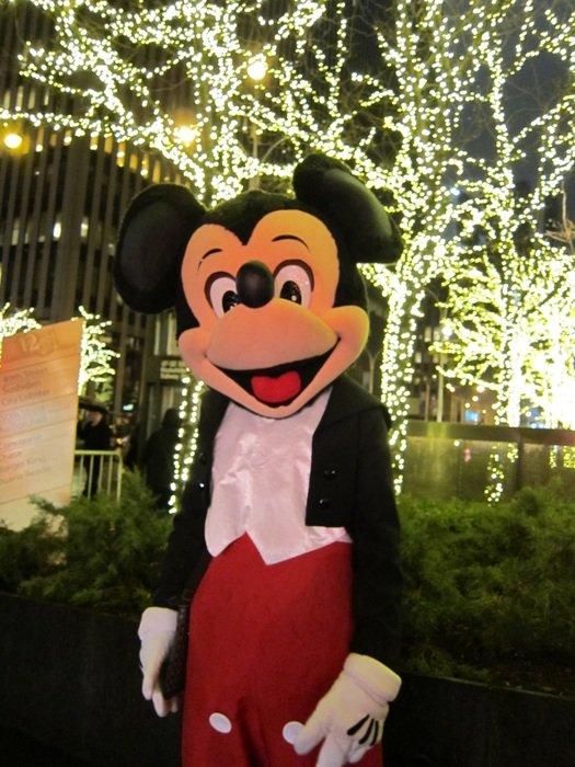 Mickey Mouse figure at Christmas lights, usa, nyc