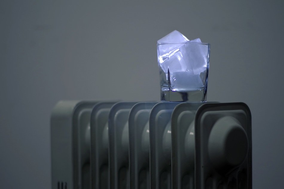 blue ice in a glass on the radiator