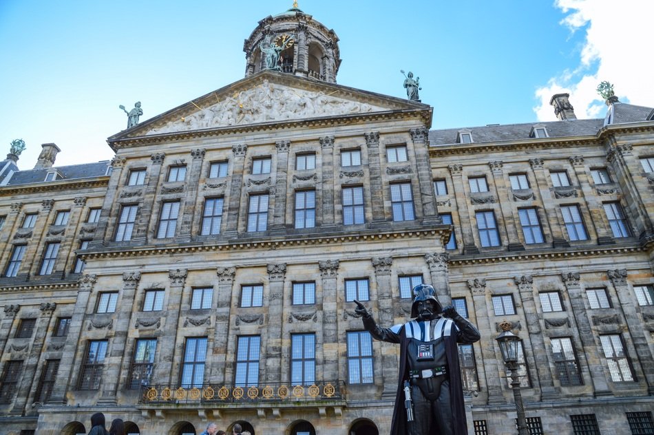 Photo of standing Darth Vader against the building