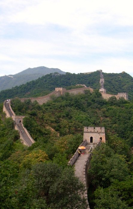 Great wall among the plants on the hills
