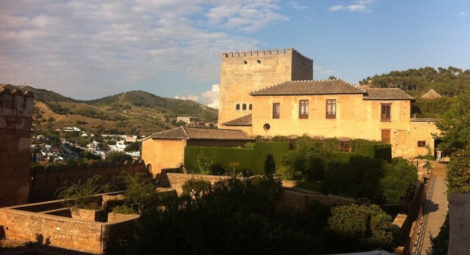 palace on mountain side at evening, spain, Granada