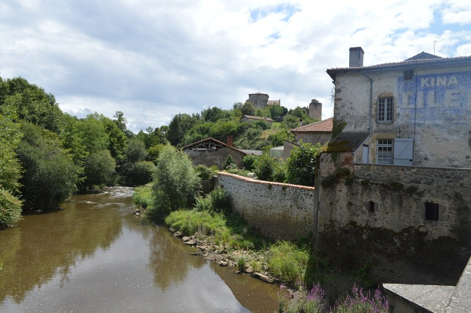 building with a fence near the river
