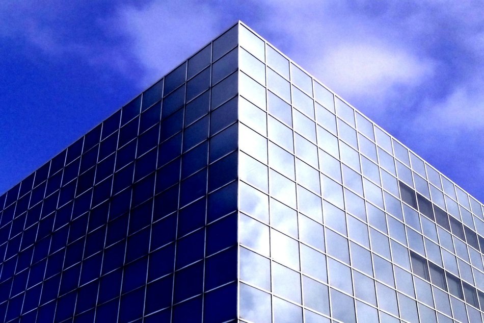 corner of Modern Office Builiding at sky
