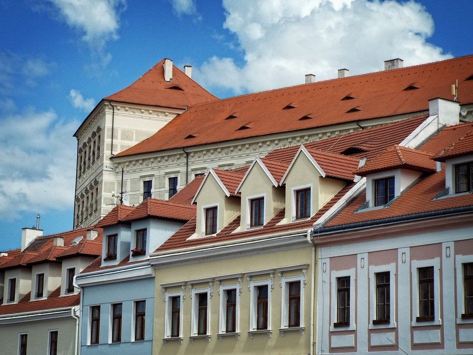 historic house with a brown roof