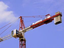 crane at a construction site against the sky