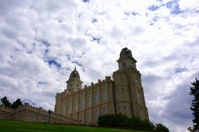 church under white clouds