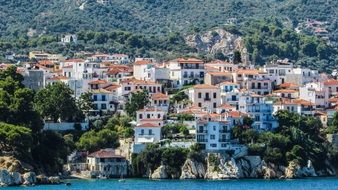 beautiful Town on rocky coast at green mountain, Greece, Skiathos Island