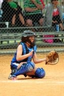 player catches ball with softball glove