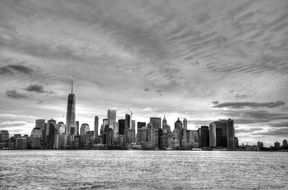 distant view of a city with skyscrapers in black and white image