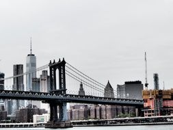 distant view of the architecture behind the Brooklyn Bridge