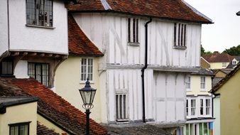 medieval brick house with wooden trim