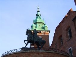 Horse rider monument on the castle in Poland