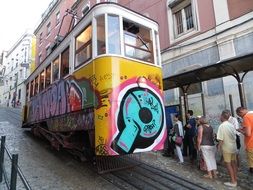 graffiti yellow tram in Lisbon